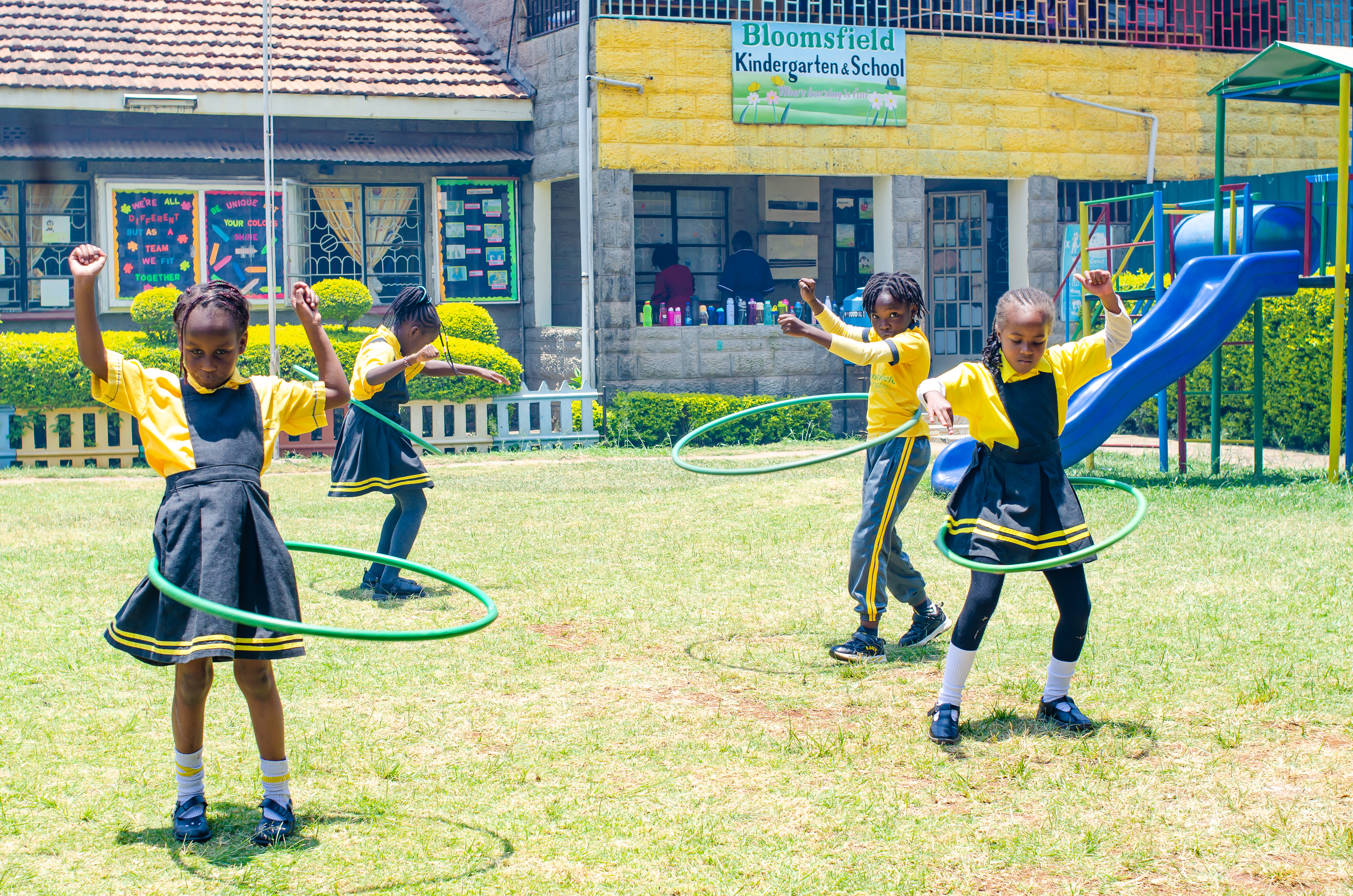 Children eating healthy lunch together in a canteen