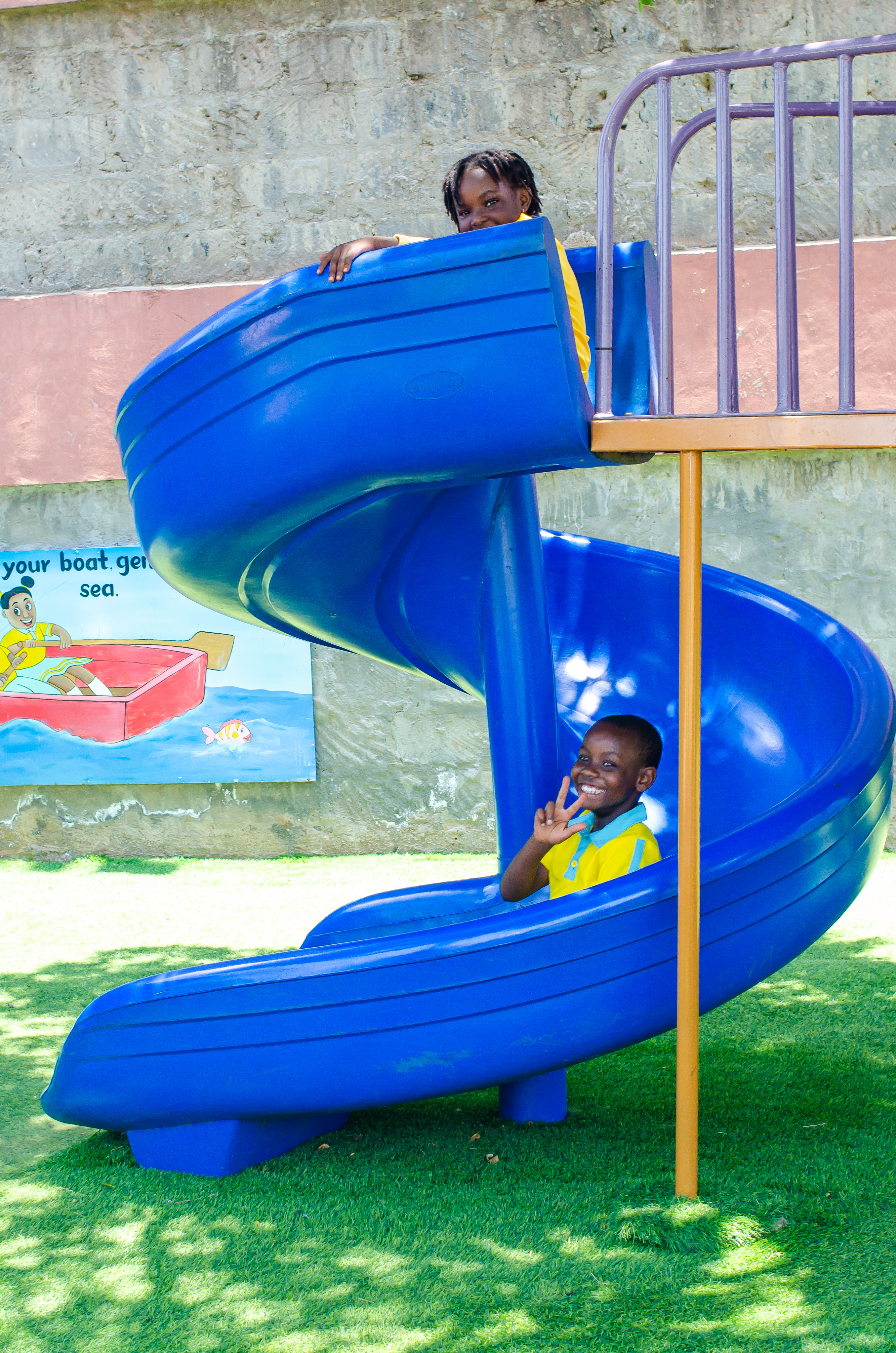Teacher helping child with science experiment
