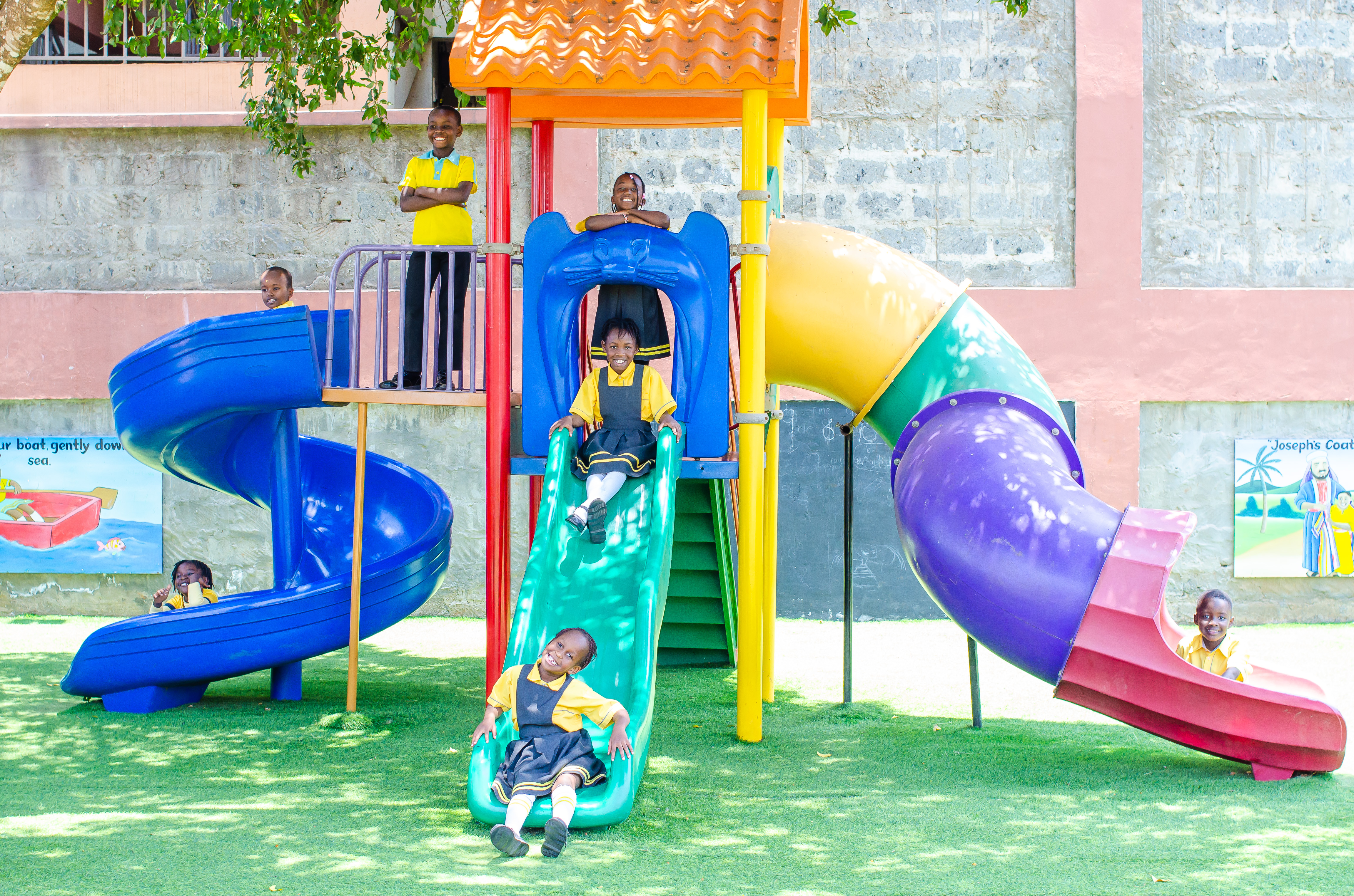 Children learning together, using books and playful activities