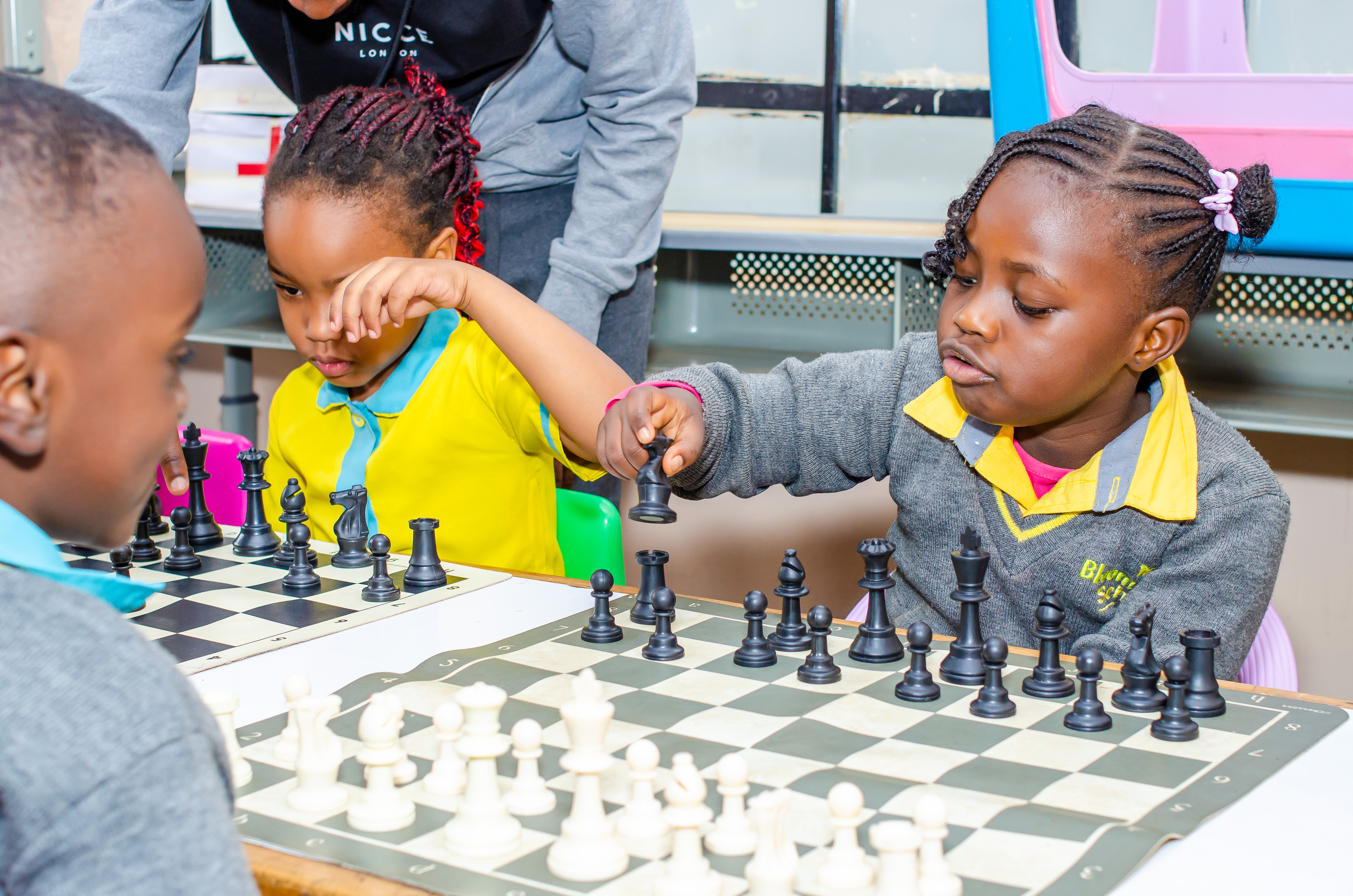 Happy children playing and learning in a classroom
