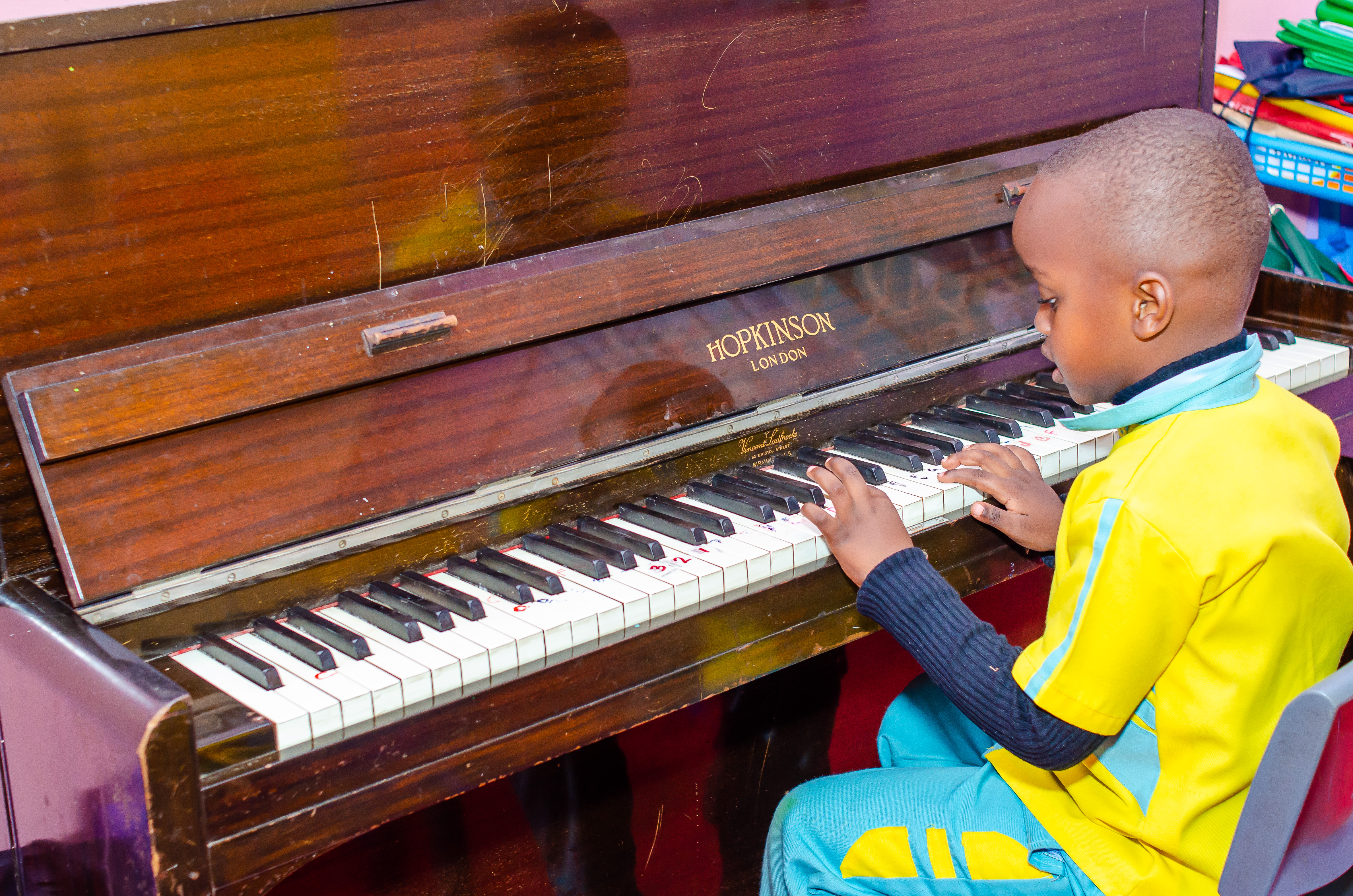 Children building with blocks together on the floor